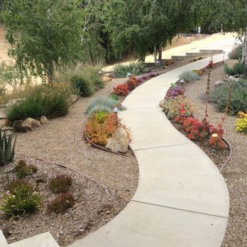 Sculptured Gardens Alive - Calabasas hillside landscape conversion from lawn to winding paths, boulders and stone mingled with accent plantings. - Landscaping Near Me Sculptured Gardens Alive - Calabasas hillside landscape conversion from lawn to winding paths, boulders and stone mingled with accent plantings. - Landscaping Near Me