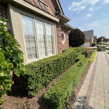 Mason Property Management - the front of a house with a brick walkway leading to the front door - Lawn Services Near Me Mason Property Management - the front of a house with a brick walkway leading to the front door - Lawn Services Near Me