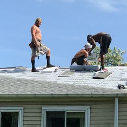 WM. Prescott Roofing & Remodeling - Shingles for the back. Ice shield shown in one of the transition areas.