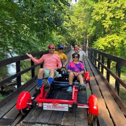 Rail Explorers - Elk River Division - Rail explorer ride with family on the bridge