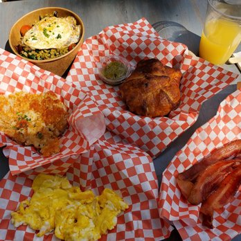 Beard & Belly - Veggie hash, bacon, eggs, smashed tot browns and the huevos rancheros handpie in the top middle. - Bakeries Near Me - Chicago, Illinois