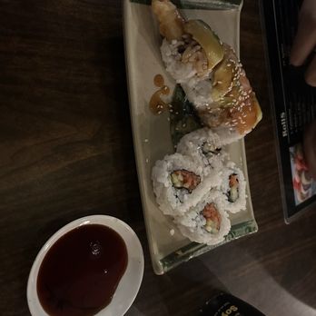 Nami Sushi - a plate of sushi and a bottle of wine - Sushi Bars Near Me - Davis, California Nami Sushi - a plate of sushi and a bottle of wine - Sushi Bars Near Me - Davis, California