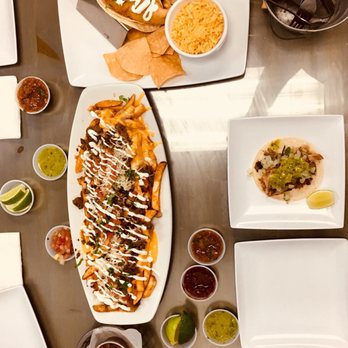 Costa Grande - Carne asada fries with carnitas taco and fish tacos - Mexican Near Me - Van Nuys, California Costa Grande - Carne asada fries with carnitas taco and fish tacos - Mexican Near Me - Van Nuys, California