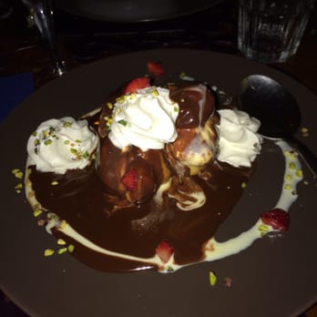 Le Vin de L'assassin - Profiterole stuffed with gelato - French Near Me - Syracuse, SR Le Vin de L'assassin - Profiterole stuffed with gelato - French Near Me - Syracuse, SR