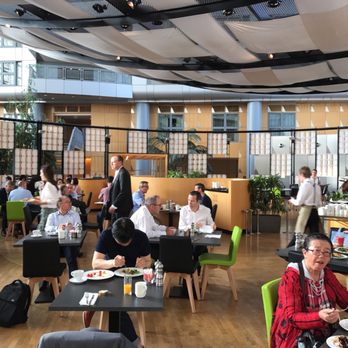 Hyatt Regency Paris - Charles de Gaulle - Seating area next to the dinning area - Hotels Near Me - Roissy, 75