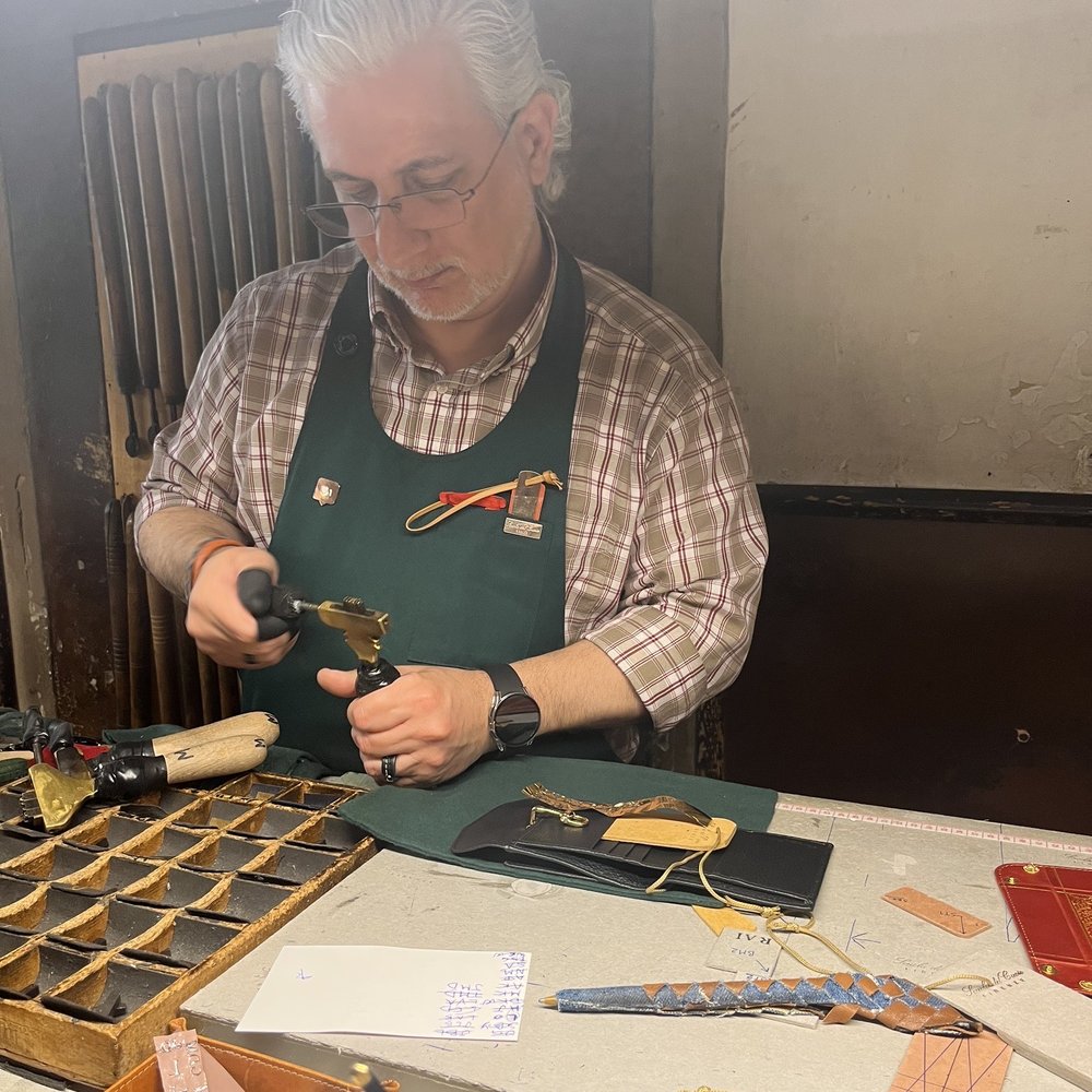 Scuola del Cuoio - Giuseppe carefully customized each item - Leather Goods Near Me - Florence, FI Scuola del Cuoio - Giuseppe carefully customized each item - Leather Goods Near Me - Florence, FI
