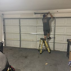 Primary Garage Door - fixing my garage door springs
