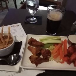 Wings, cup of green chili, and Nitro Stout.