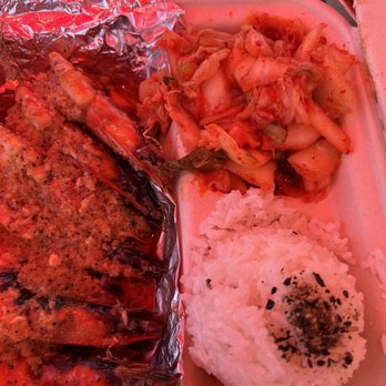 Wake Up Delicious - Garlic shrimp with rice and kim chee under the red umbrella. - Hawaiian Near Me - Hanalei, Hawaii Wake Up Delicious - Garlic shrimp with rice and kim chee under the red umbrella. - Hawaiian Near Me - Hanalei, Hawaii