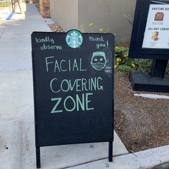 Starbucks - Face covering reminder signage at drive thru entrance - Coffee & Tea Near Me - San Diego, California
