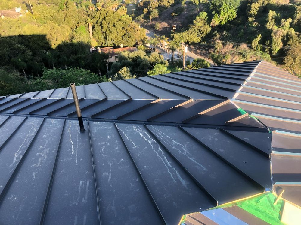 Slide of Santiagos Roofing