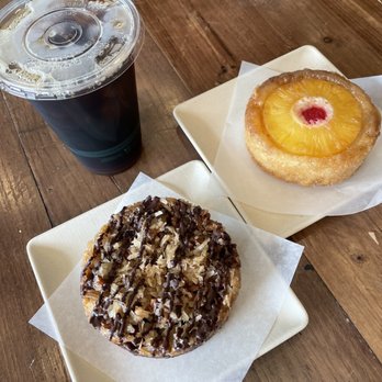 Sunflower Bakehouse - German chocolate upside down cake, pineapple upside down cake and iced cold brew coffee. - Vegan Near Me - Nashville, Tennessee Sunflower Bakehouse - German chocolate upside down cake, pineapple upside down cake and iced cold brew coffee. - Vegan Near Me - Nashville, Tennessee