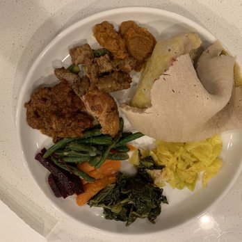 Abyssinia Restaurant and Cafe - A sampling from both the vegetarian and meat platters. - Ethiopian Near Me - Phoenix, Arizona Abyssinia Restaurant and Cafe - A sampling from both the vegetarian and meat platters. - Ethiopian Near Me - Phoenix, Arizona