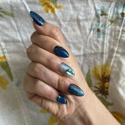 Sapphire Blue Cat Eye Manicure with Custom Design.