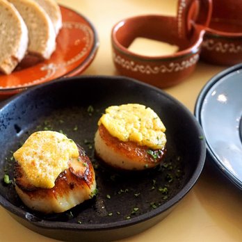 Petiscos - Scallops, Seared, with a Curry Crust: two scallops seared in the pan with a curry crust ($25). - Portuguese Near Me - San Jose, California