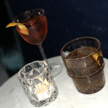The Dandy Crown - The Rosita (L) and their House Old Fashioned (R) that features a small twist on this cocktail. - Cocktail Bars Near Me - Chicago, Illinois The Dandy Crown - The Rosita (L) and their House Old Fashioned (R) that features a small twist on this cocktail. - Cocktail Bars Near Me - Chicago, Illinois