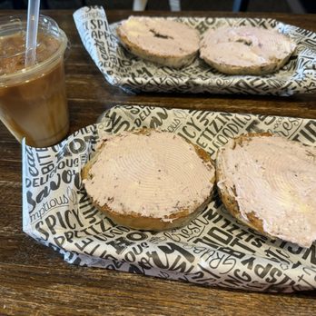Broadway Bean and Bagel - Blueberry bagel with lemon blueberry cream cheese, and an iced macchiato. - Coffee & Tea Near Me - Minot, North Dakota