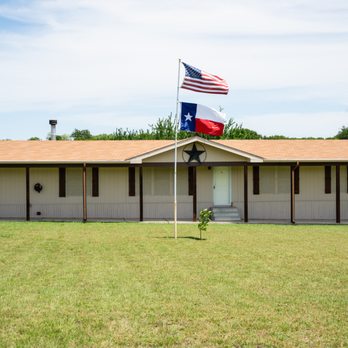 Able Home Repair - a texas flag flying in front of a home - General Contractors Near Me Able Home Repair - a texas flag flying in front of a home - General Contractors Near Me
