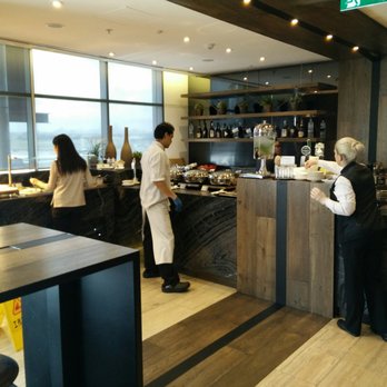 American Express Lounge - Food and bar area. Small but sufficient. - Airport Lounges Near Me - Mascot, NSW American Express Lounge - Food and bar area. Small but sufficient. - Airport Lounges Near Me - Mascot, NSW
