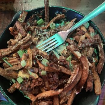 Food + Beer - Overcooked loaded fries clearly with little to no cheese. - Sports Bars Near Me - Tampa, Florida Food + Beer - Overcooked loaded fries clearly with little to no cheese. - Sports Bars Near Me - Tampa, Florida