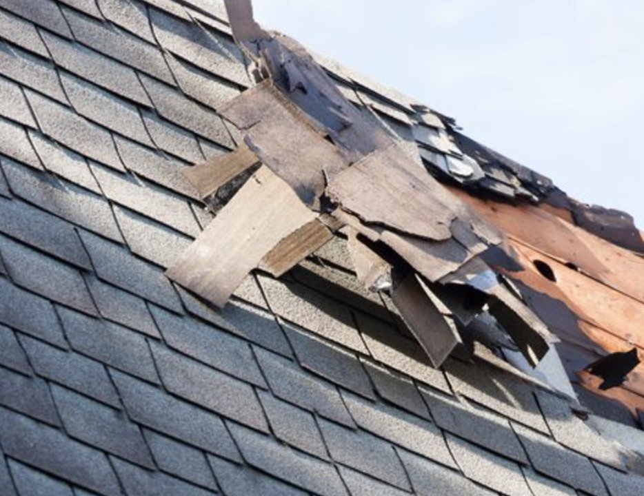 Slide of TM Roofing & Construction Group