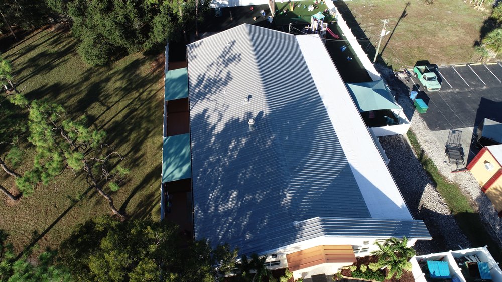 Slide of CFS Roofing Services