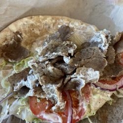 Tiny pieces of lamb with a bland yogurt sauce; tasteless