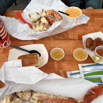 Tracy's King Crab Shack - This is $183 worth of experience. One King Crab leg and one Dungeness Crab Combo, plus 2 cokes. - Bars Near Me - Juneau, Alaska Tracy's King Crab Shack - This is $183 worth of experience. One King Crab leg and one Dungeness Crab Combo, plus 2 cokes. - Bars Near Me - Juneau, Alaska