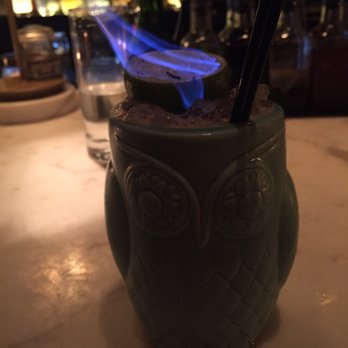 Yvonne's - The zombie (w/o flash) with a flaming lime on top. Great citrus flavor. - New American Near Me - Boston, Massachusetts