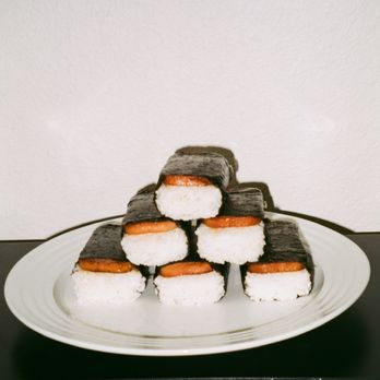 Island Munchies - a stack of sushi on a plate - Hawaiian Near Me - Phoenix, Arizona Island Munchies - a stack of sushi on a plate - Hawaiian Near Me - Phoenix, Arizona