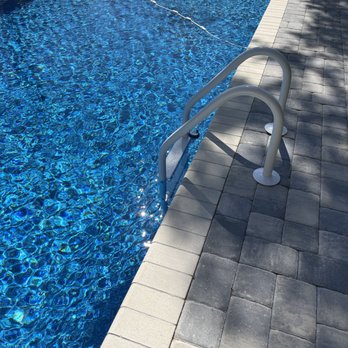 Dolphin Pools - the steps leading to the pool - General Contractors Near Me - Gulf Breeze, Florida Dolphin Pools - the steps leading to the pool - General Contractors Near Me - Gulf Breeze, Florida