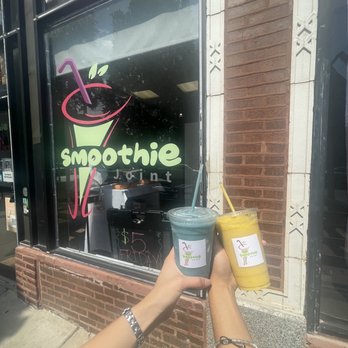 Smoothie Joint - a hand holding a cup of smoothie - Juice Bars & Smoothies Near Me - Chicago, Illinois