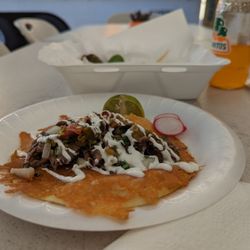 Flacos Tacos - My third taco  look how they cook their flour tortillas. And the Flaco meat, aka shredded beef, is super fire.