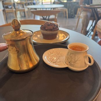 Qurbah - Karak chai and chocolate muffin - Coffee & Tea Near Me - Pearland, Texas Qurbah - Karak chai and chocolate muffin - Coffee & Tea Near Me - Pearland, Texas
