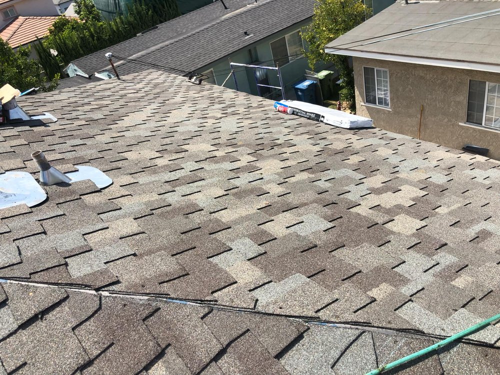 Slide of Santiagos Roofing