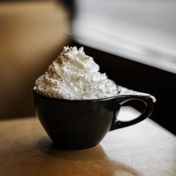 Palace Coffee - a cup of whipped cream on a table - Coffee & Tea Near Me - Amarillo, Texas Palace Coffee - a cup of whipped cream on a table - Coffee & Tea Near Me - Amarillo, Texas