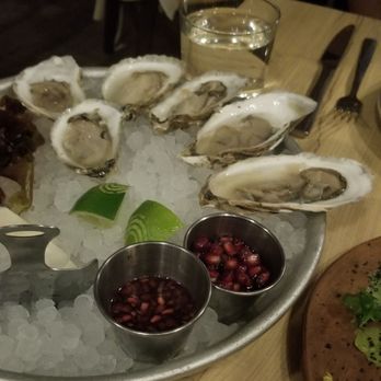 Colita - Oysters with the pomegranate relish - New American Near Me - Minneapolis, Minnesota