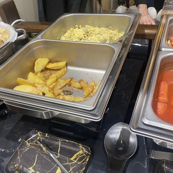 Nord Lyon - Scrambled eggs and potato wedges - French Near Me - Toronto, Ontario
