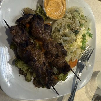 Brocheta Mediterranean Bistro - Steak skewer on grilled veggies and marinated coleslaw. - Mediterranean Near Me - McAllen, Texas Brocheta Mediterranean Bistro - Steak skewer on grilled veggies and marinated coleslaw. - Mediterranean Near Me - McAllen, Texas