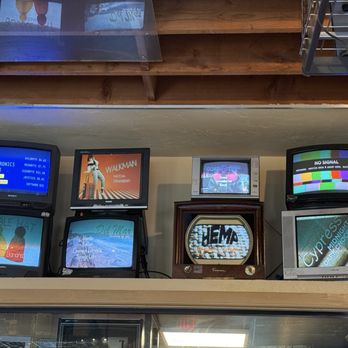 An’s Electronics Repair - Flavors and pricing shown on tv screens! (If you're young enough, you can hear the light buzz) - Desserts Near Me - San Diego, California