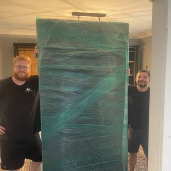Miracle Movers - Tall shelves padded and stretch wrapped - Movers Near Me - Decatur , Alabama Miracle Movers - Tall shelves padded and stretch wrapped - Movers Near Me - Decatur , Alabama
