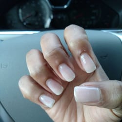 Julie's Nails II - Sloppy and Rushed. Cuticles look Crazy because he did not DO THEM!!??? I asked for a FULL MANICURE SIR!!! WTF