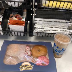 REBEL Convenience Stores - Half dozen fresh baked donuts. I chose glazed & frosted with sprinkles both of which were delicious. Grabbed a medium coca-cola icee too!