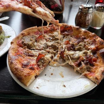 Coals Artisan Pizza - Look at that cheese pull on this small Buchertown! This is lunch size!!!! - Italian Near Me - Louisville, Kentucky Coals Artisan Pizza - Look at that cheese pull on this small Buchertown! This is lunch size!!!! - Italian Near Me - Louisville, Kentucky