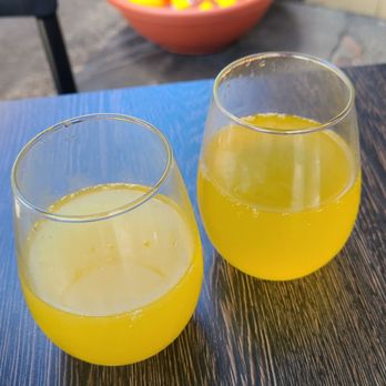 Over Easy - Lilikoi mimosa and regular mimosa ($10 each) - Breakfast & Brunch Near Me - Kailua, Hawaii Over Easy - Lilikoi mimosa and regular mimosa ($10 each) - Breakfast & Brunch Near Me - Kailua, Hawaii
