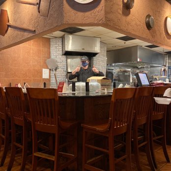 Carrabba's Italian Grill - a chef preparing food - Italian Near Me - Wilmington, North Carolina Carrabba's Italian Grill - a chef preparing food - Italian Near Me - Wilmington, North Carolina