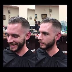 Apple Valley Inn Barber Shop - Mid high skin Fade & hair combed to the side and back