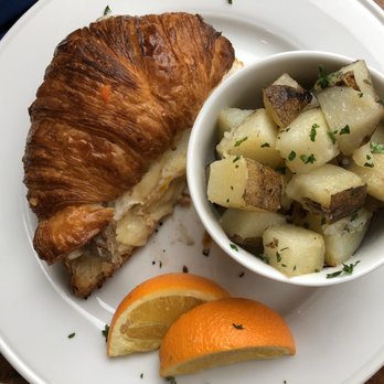 Charmed Kitchen - Breakfast sandwich on croissant with side of potatoes - Bakeries Near Me - Baltimore, Maryland Charmed Kitchen - Breakfast sandwich on croissant with side of potatoes - Bakeries Near Me - Baltimore, Maryland