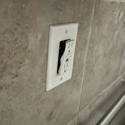Anytime Fitness - A broken and exposed electrical outlet. A major safety concern that has remain unaddressed, despite the maintenance fees and the rate hikes.