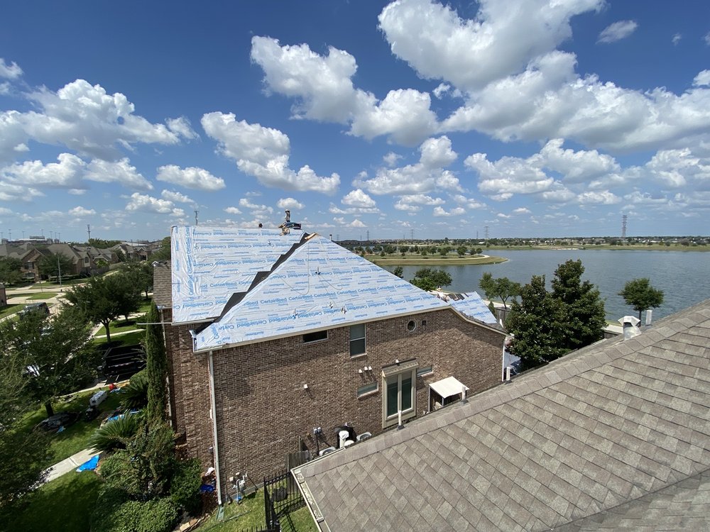 Slide of Moss Roofing Houston